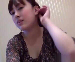 Japanese teen cutie massages cock with feet before riding