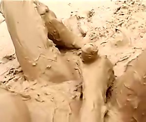 Lady masterbating in mud