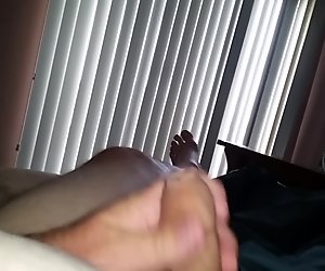 stroking my uncut cock, wifes hairy pussy in background